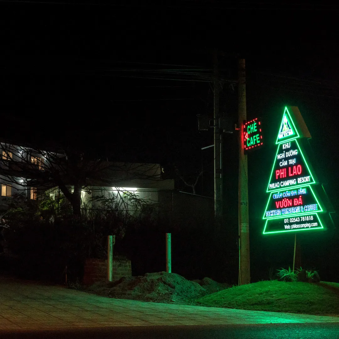 Philao Camping front gate sign at night
